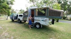 Ashleigh, in front of her and her husband Anthony's pop-up trailer / home.